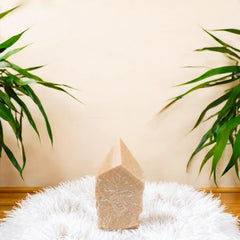 SAMSARI Feldspar crystal point portable size fits into bags for on-the-go spiritual routines.