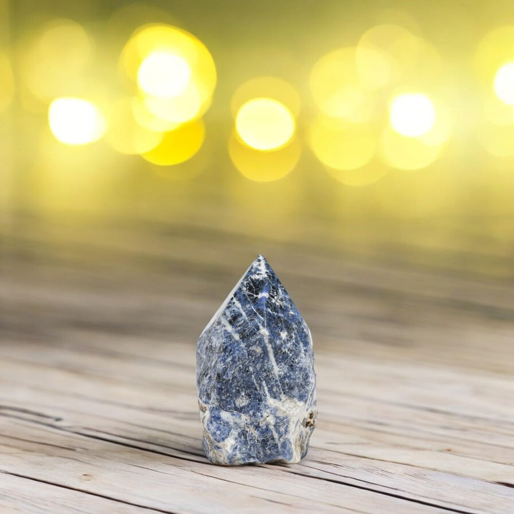 SAMSARI sodalite points enhance calm in home decor and meditation spaces.