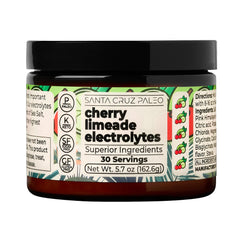 Santa Cruz Paleo Electrolyte Powder Cherry Limeade being poured for sugar-free hydration.