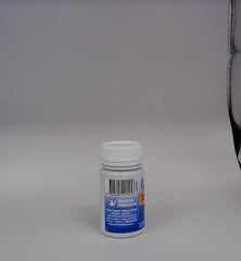 Tablets being dispensed from the bottle, handy for on-the-go use.