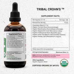 Secrets of the Tribe turmeric root bottle closeup with vibrant color