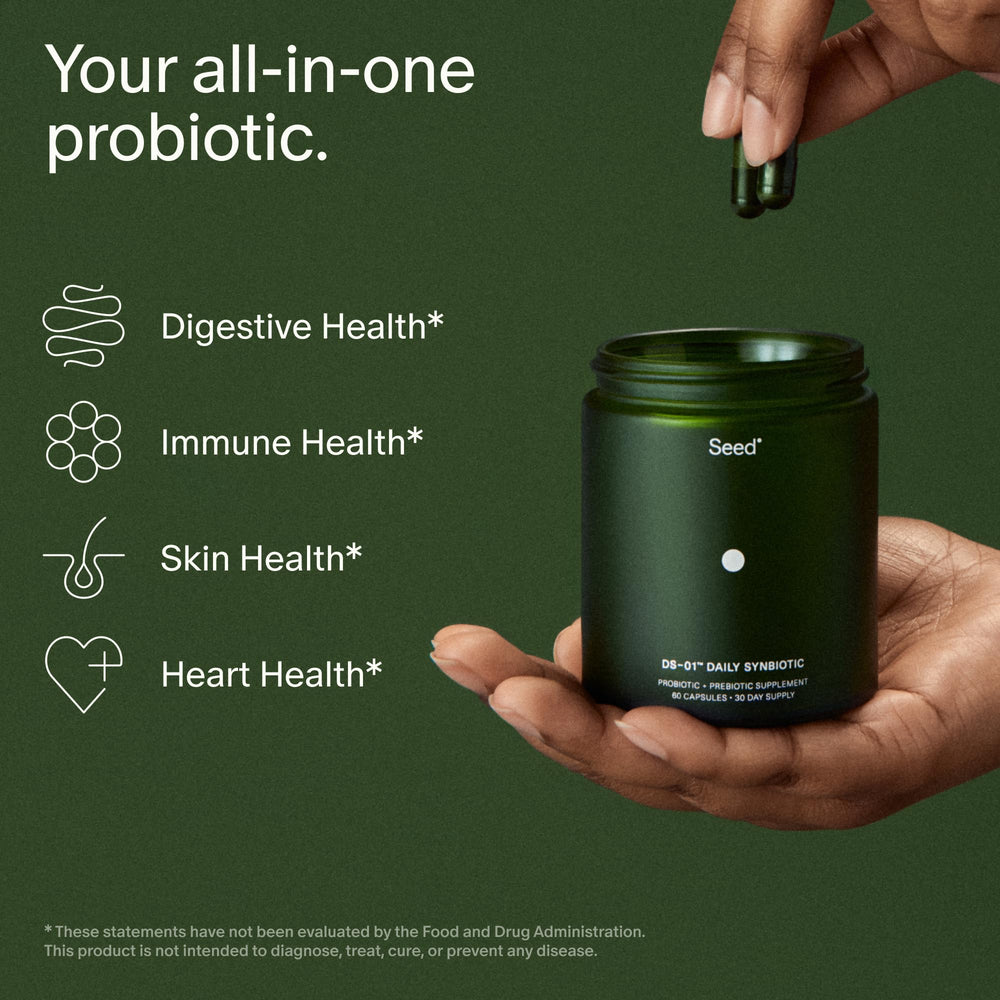 Seed DS-01 capsules close-up showing dual prebiotic-probiotic design for gut health.