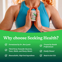 Bottle and glass with HistaminX capsules suggest everyday digestive support.