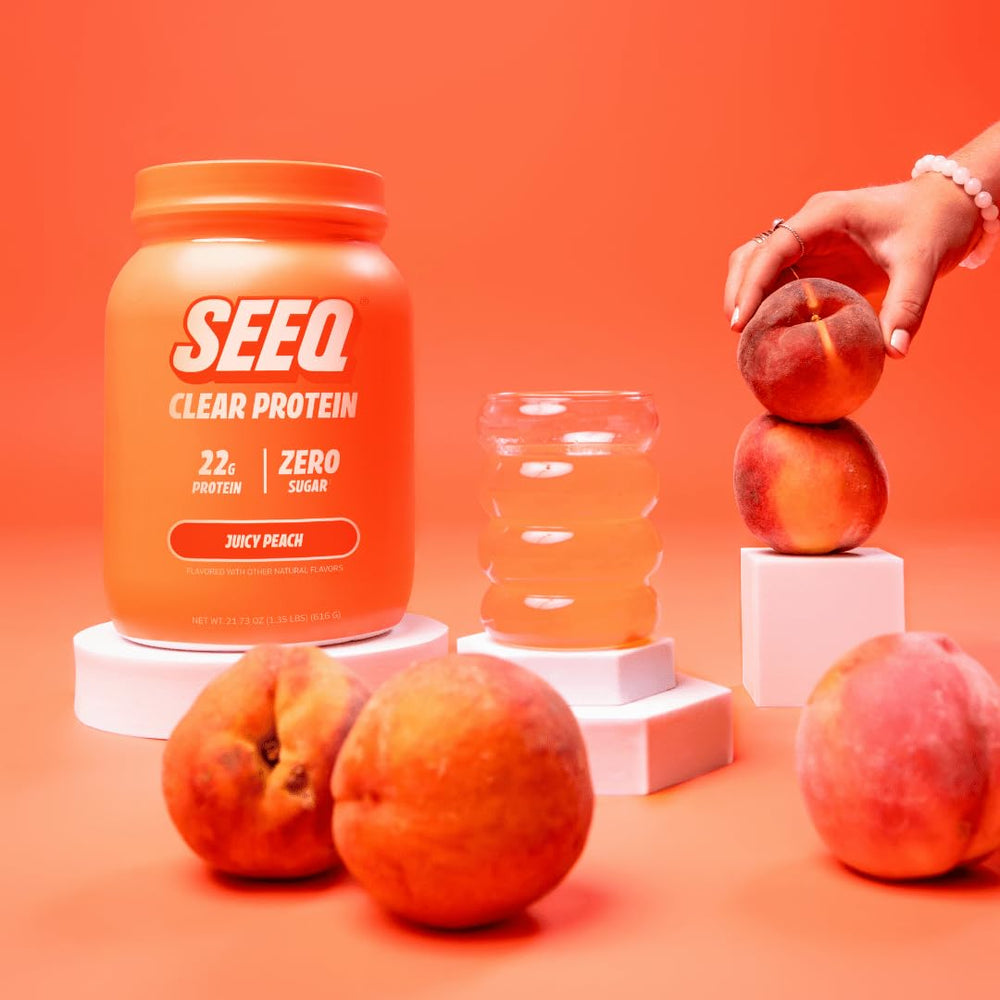 SEEQ Juicy Peach powder being poured into water for a light, refreshing shake.