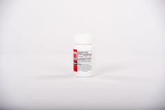 Senokot NU-IRON bottle open with capsules ready to take.
