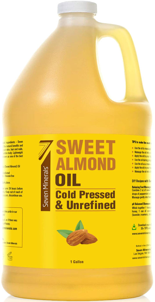 Seven Minerals Sweet Almond Oil bottle pour for skin hydration and gentle hair conditioning.