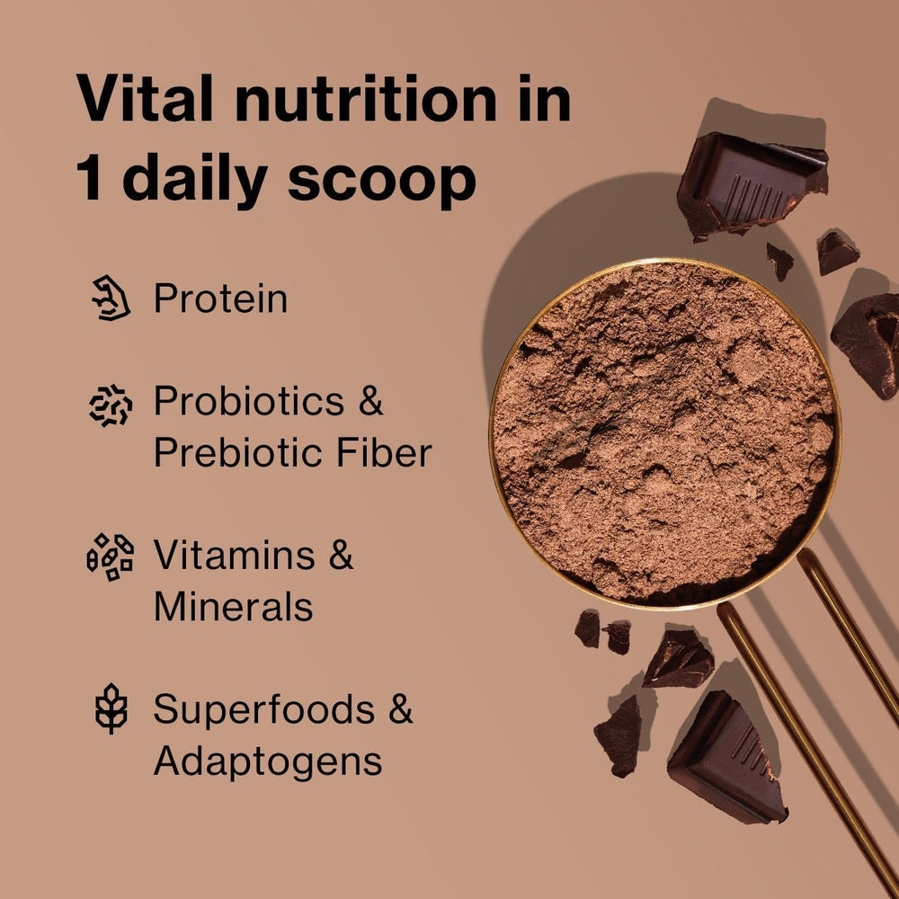 Shakeology Cafe Latte shake in glass ready to enjoy a cafe-style drink.