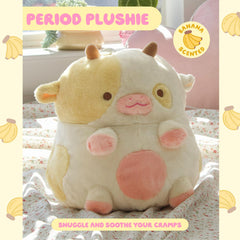 Shopzoki strawberry cow plush resting on a bed for relaxing comfort.