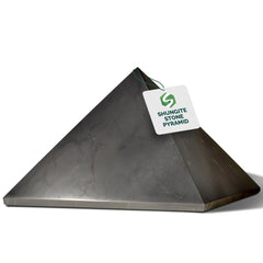Shungite World authentic pyramid 150mm top view, grounding centerpiece for calm spaces.