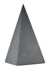 Shungite World authentic tall pyramid on a desk for energy balance near electronics