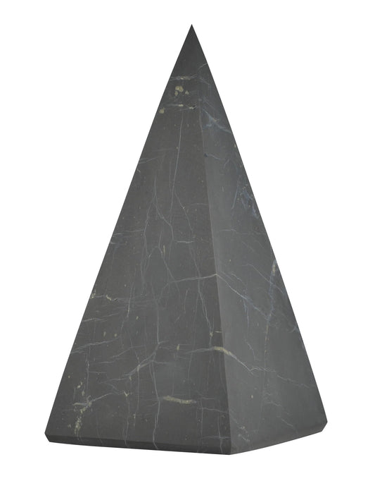 Shungite World authentic tall pyramid 60mm sits beside devices for calm focus.