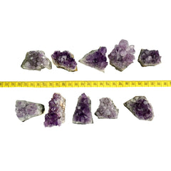 Sisamn Amethyst clusters handheld collection shows natural variety and size range.