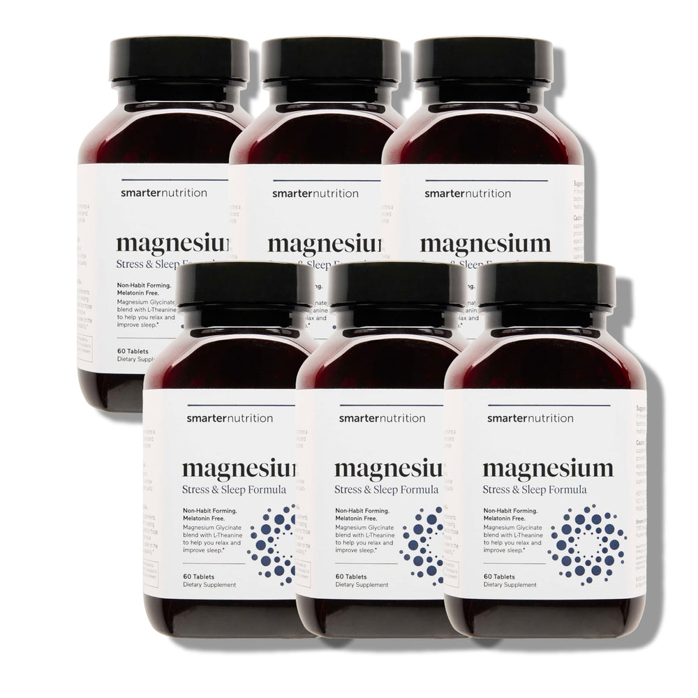 Smarter Magnesium Complex bottle on nightstand suggesting sleep support.