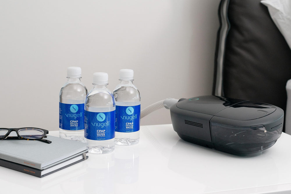 Snugell travel pack of 12oz bottles, portable for trips.