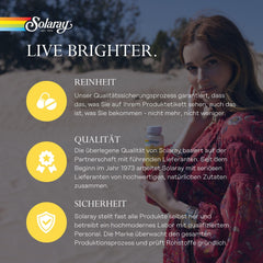 Person holding Solaray Continence Flowtrol bottle during morning routine