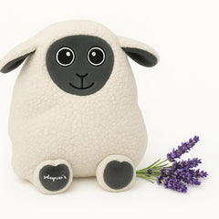 Solayman's Cozy Sheep heating pad on lower belly delivers soothing cramps warmth.