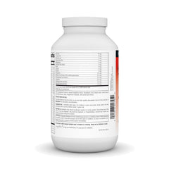 Source Naturals Mega-Kid daily-dose berry wafers beside a glass.