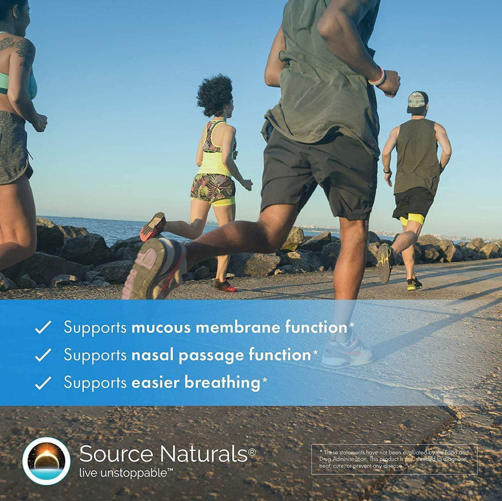 Source Naturals Wellness Formula daily-use bottle with water, ideal during travel.