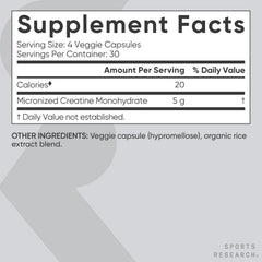 Sports Research Creatine Monohydrate Capsules in hand, supports strength and recovery when paired with workouts.