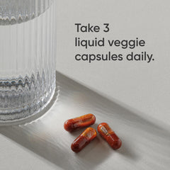 Sports Research liposomal Vitamin C capsules closeup highlighting liposome encapsulation and absorption.