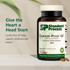 Standard Process Cardio-Plus GF capsules poured illustrating daily supplement routine.