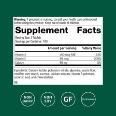 Standard Process Cataplex D tablets arranged on white background for bone health focus.