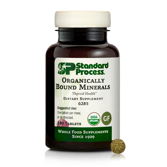 Standard Process Organically Bound Minerals bottle wide, convenient daily supplementation.
