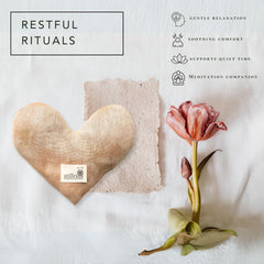 Stillnus weighted heart shape supports soothing touch during rest and focus.