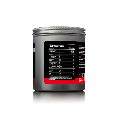 Strength Genesis Pur Zealander Whey Vanilla pouring into glass highlights smooth texture.