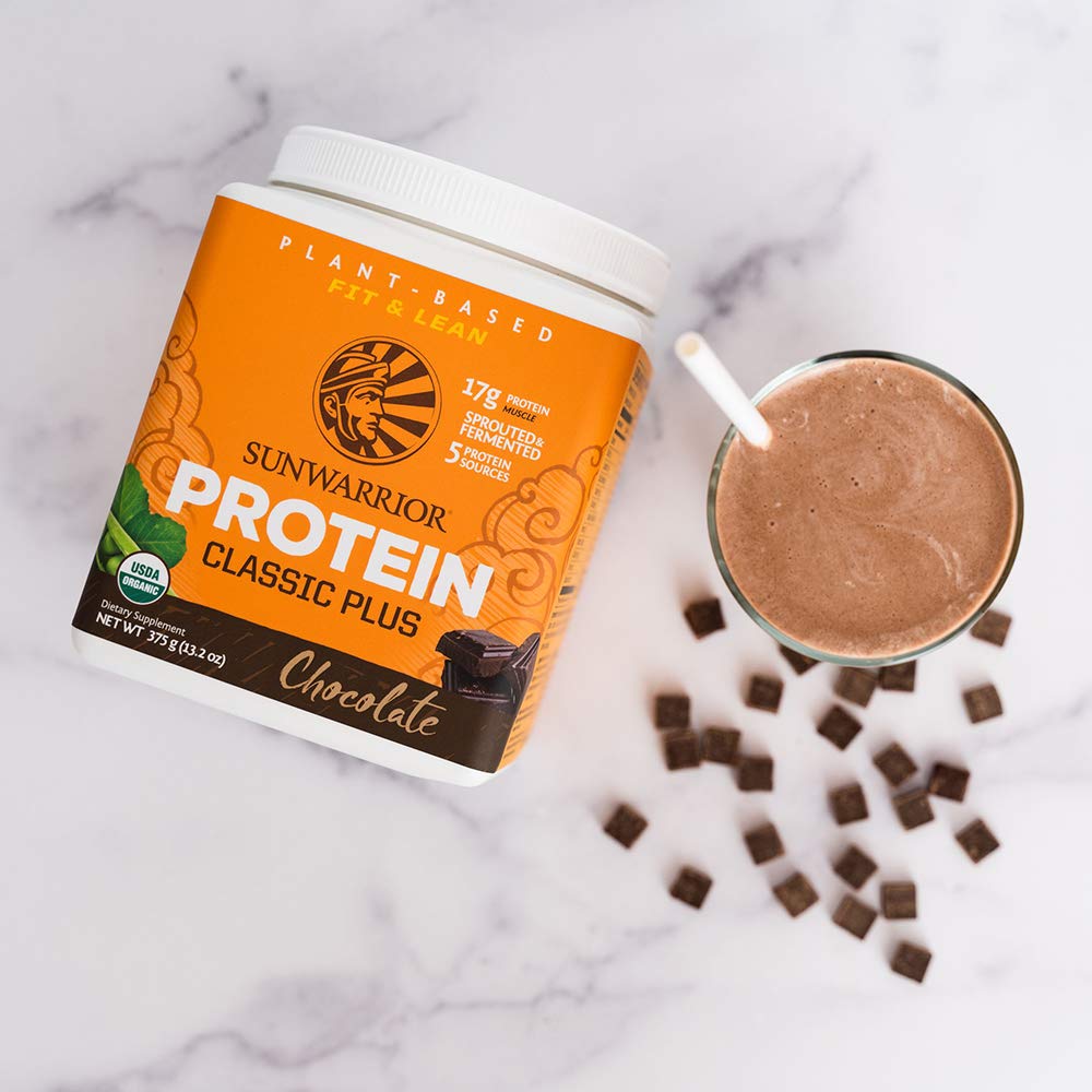 Sunwarrior chocolate powder stirred into oatmeal for protein-rich breakfast