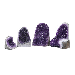 SUPERIOR Amethyst cluster shown against warm wood background for cozy decor