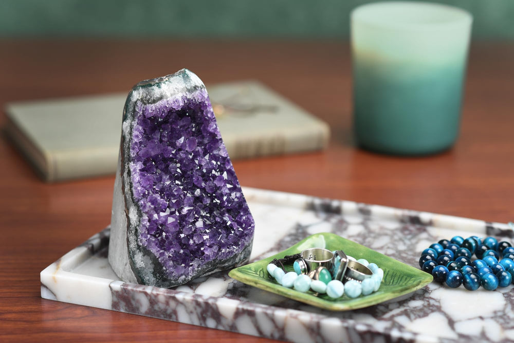 Superior amethyst geode on flat basalt base ready to display