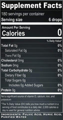 Glass bottle on countertop emphasizes premium hydration and clean ingredients.