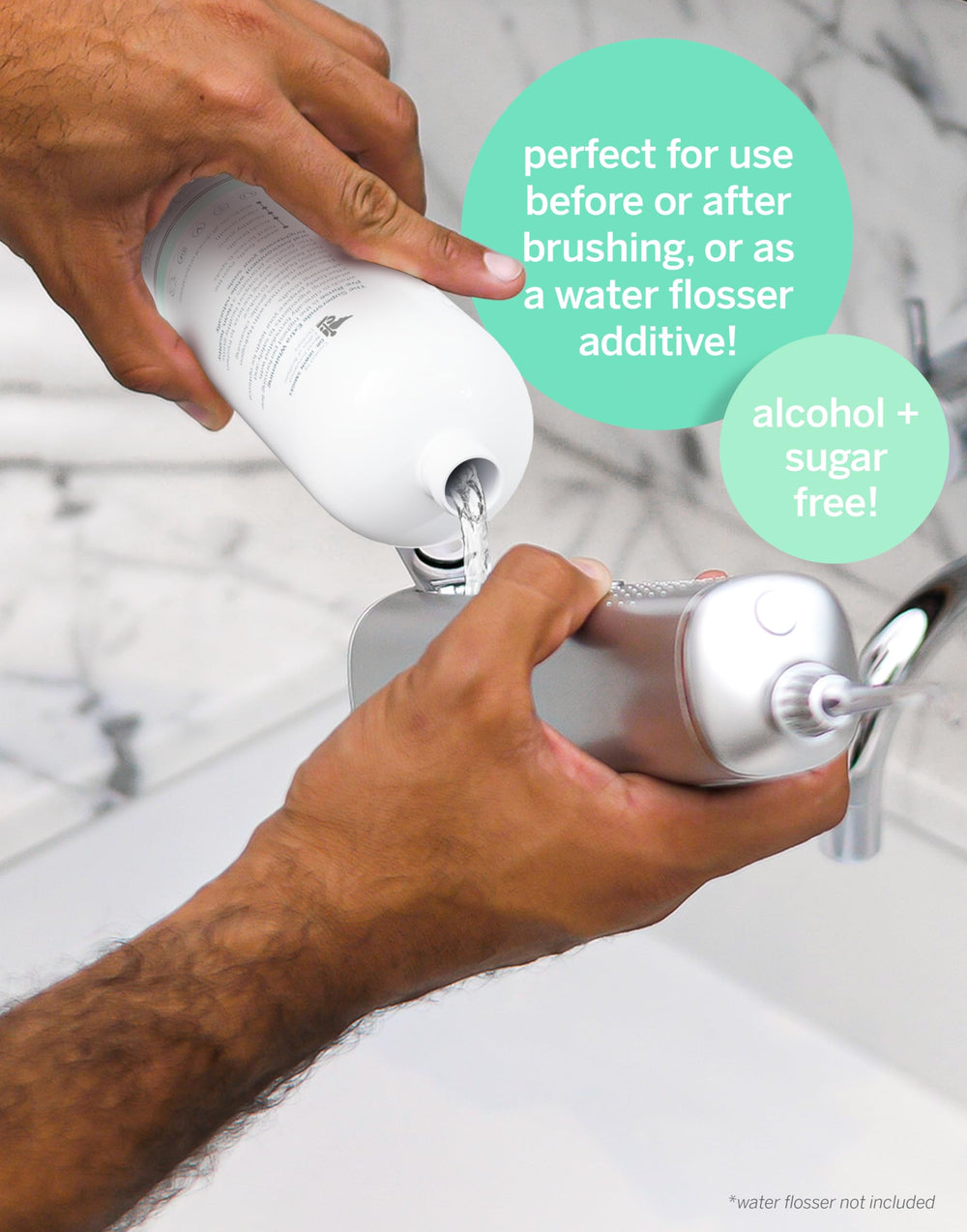 Bathroom use scene with Supersmile pre-rinse in hand