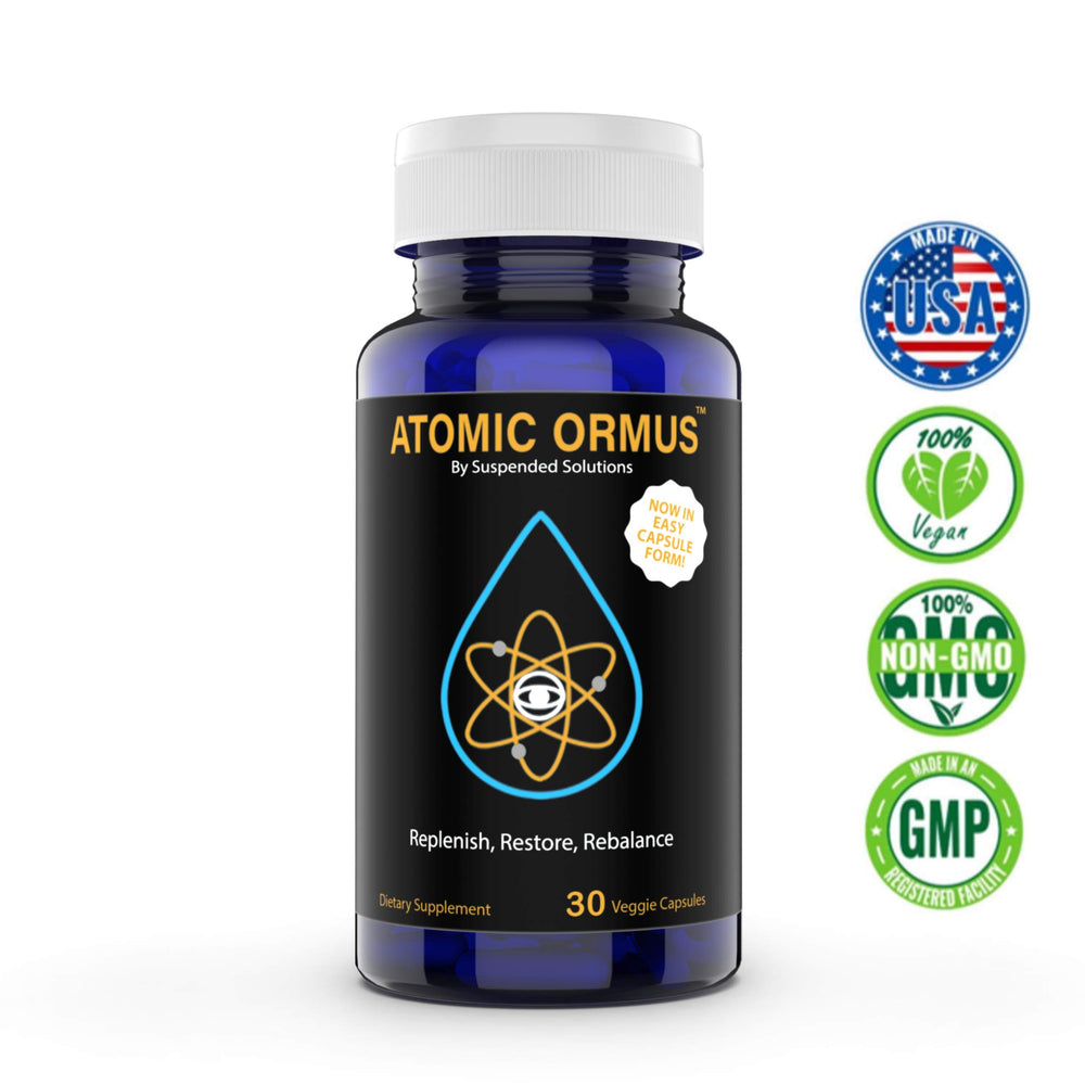 Closeup of Suspended Solutions Atomic ORMUS capsules, high-purity dosing for daily routines.