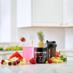 SweetCre Creatine Monohydrate scoop beside powder for easy daily use.