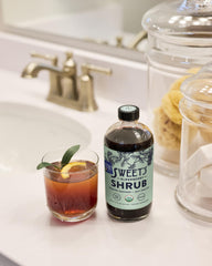 Awards badge on Sweet's Elderberry Shrub packaging signaling trusted quality