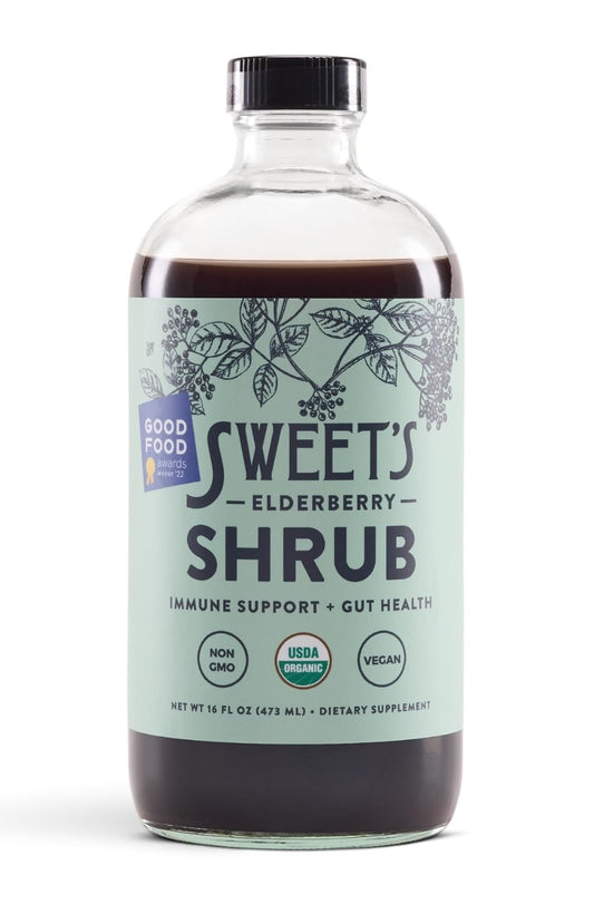 Sweet's Elderberry Shrub bottle on a table for everyday wellness