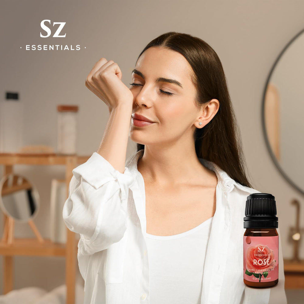 Sz Essentials Rose Absolute Oil in a spa-like bathroom setup for mood uplifting.