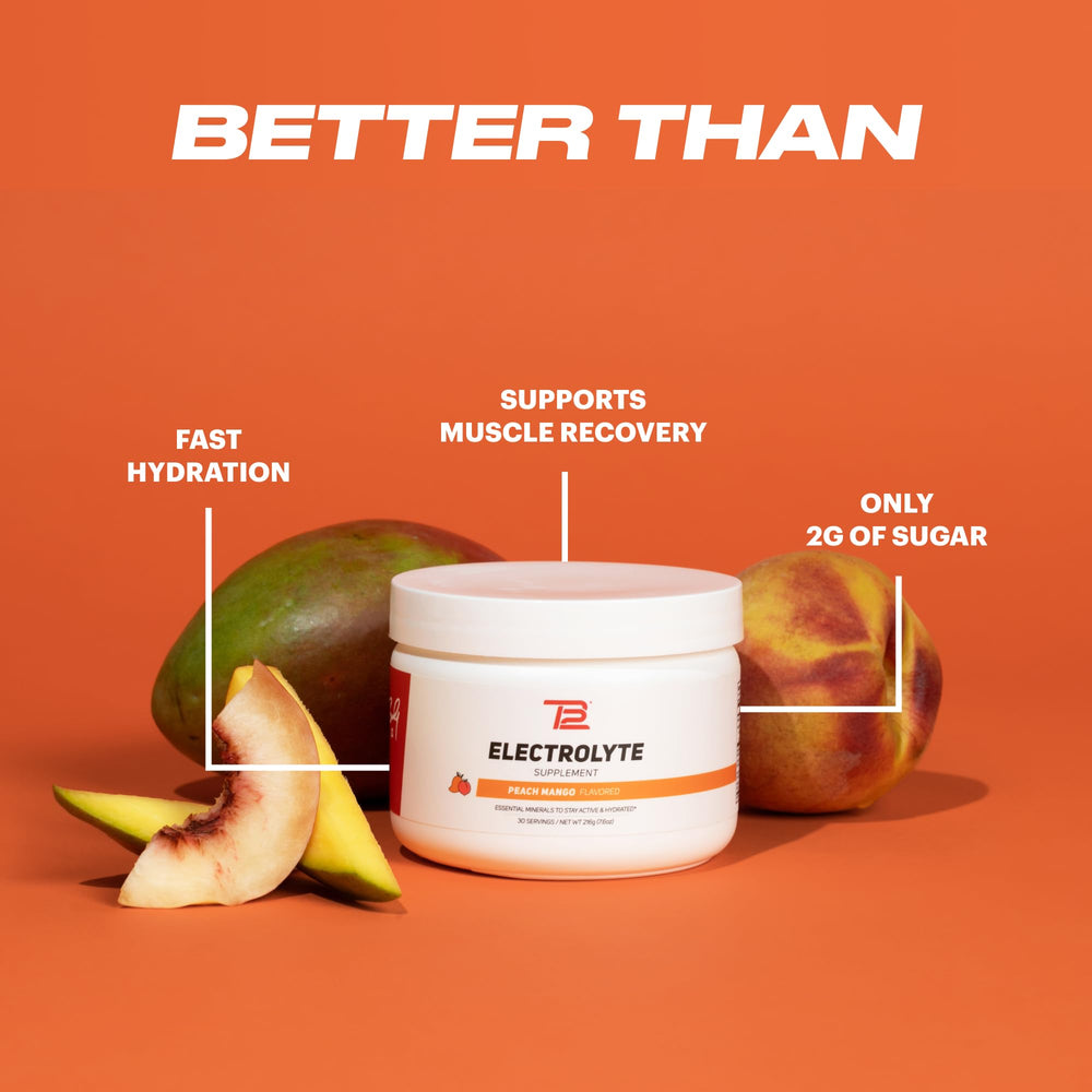Scoop of TB12 Electrolyte Powder Peach Mango measuring a serving for hydration