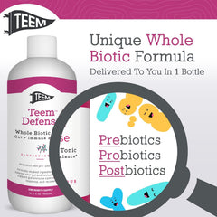 Pouring Teem Defense into glass shows a tangy elderberry probiotic boost ready to enjoy.