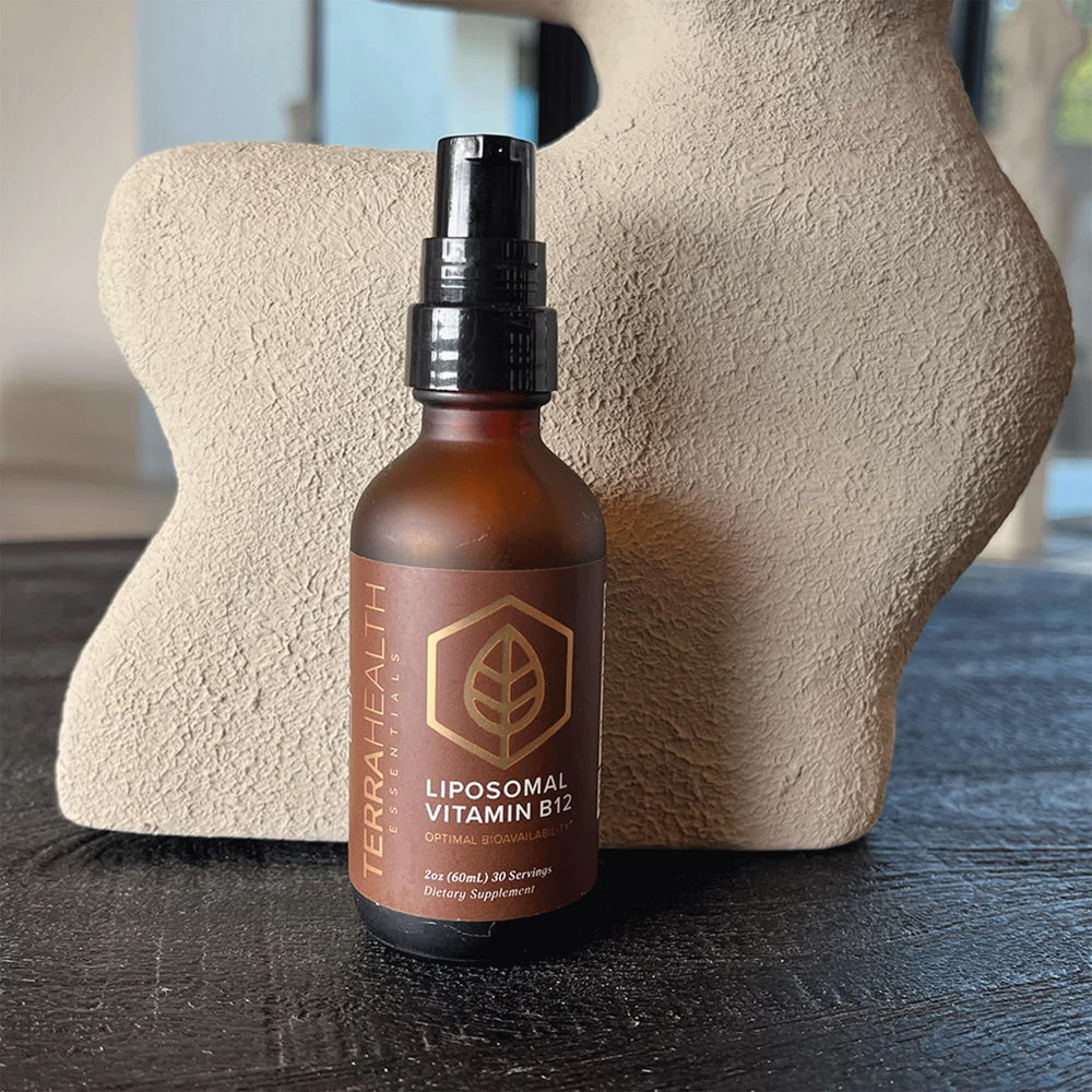 Terra Health Essentials Liposomal B12 packaging box beside bottle for convenient daily supplementation.