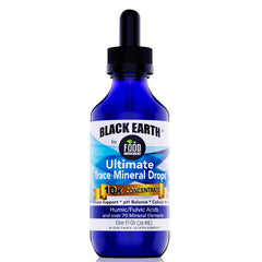 The Food Movement Co. Black Earth bottle label closeup highlighting a 70+ trace minerals blend for daily wellness.