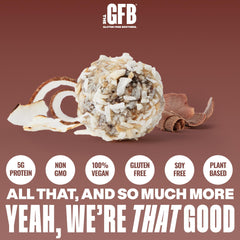 Close-up of The GFB bites with dark chocolate and toasted coconut.