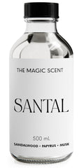The Magic Scent Santal diffuser oil bottle — warm sandalwood and cardamom for inviting spaces.