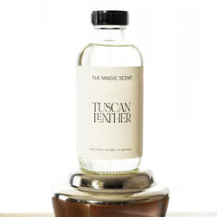 The Magic Scent Tuscan Leather diffuser oil label highlighting vegan formula