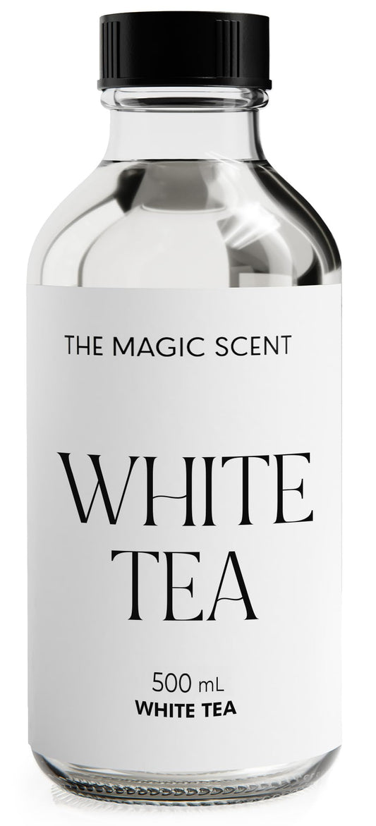 The Magic Scent White Tea Diffuser Oil bottle on a surface creates a calm bedroom ambiance.