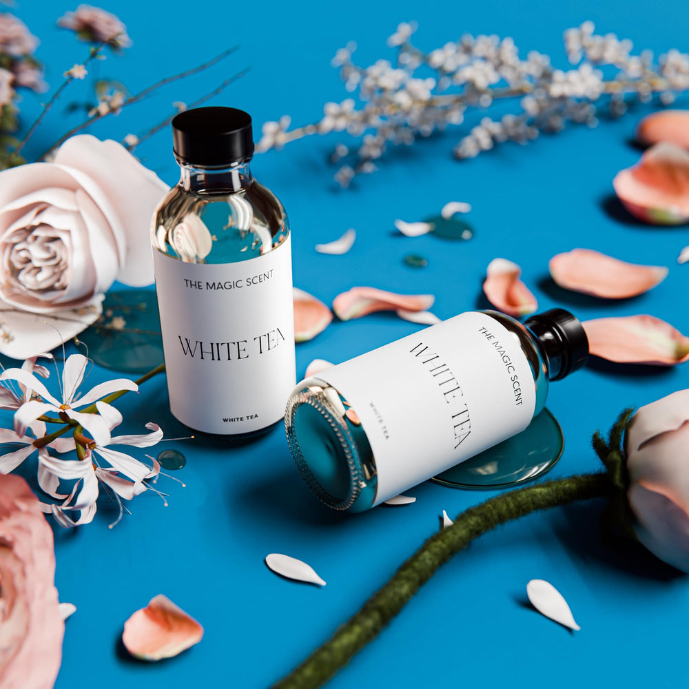 Amber vanilla hints emerge from the diffuser oil in warm lighting.