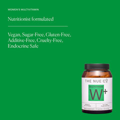 The Nue Co Women's Multivitamin packaging flatlay with practical lifestyle context.