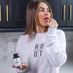 TheRootBrands Root Wellness Immune vitamin D C K2 bottle highlights key nutrients.